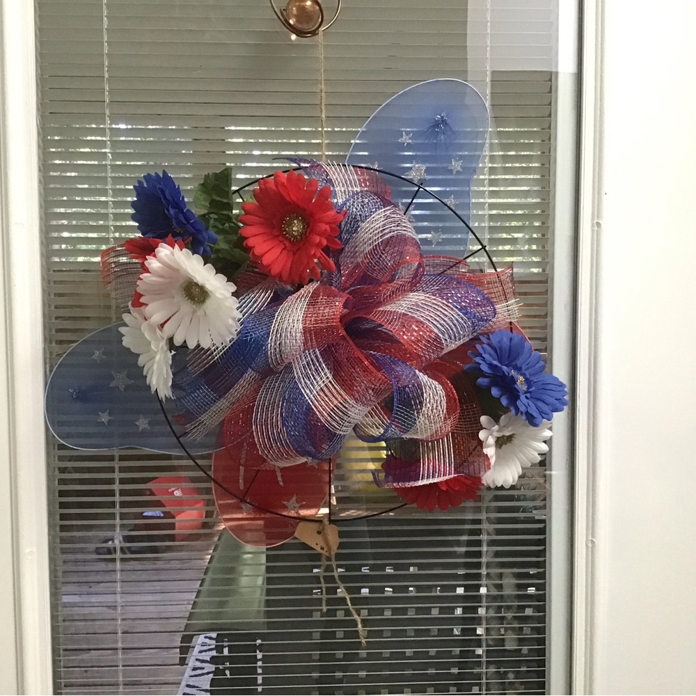 Patriotic Floral Wreath with Red, White, and Blue Flowers